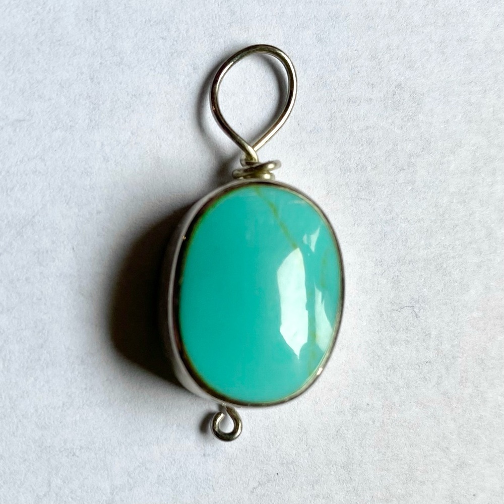 Oval Turquoise in Silver Pendant